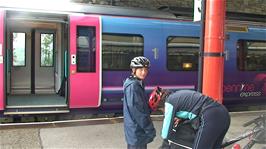 Group 1 put panniers on their bikes at Oxenholme station while we wait for Group 2 to arrive